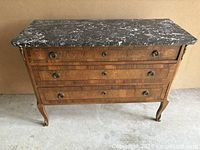 Front and top view of commode showing marble top and drawer fronts