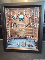 Front view of framed cartoon showing entire artwork and frame