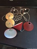 overview of three shades, two canopies and wiring