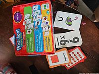 Open box with visible flashcard puzzle pieces