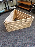 Triangular pine slatted planter box front and side view
