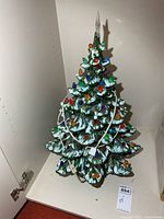 Front view of ceramic Christmas tree showing size, colour, and wiring