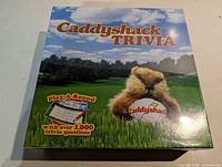 Front of sealed Caddyshack Trivia game box
