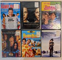 Front view of all six sealed DVDs in lot