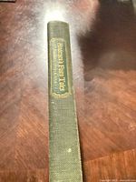 spine showing gilt title on green cloth