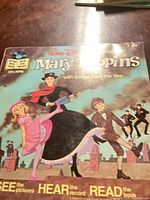 Front cover of Mary Poppins book showing title and artwork