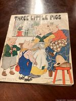 Front cover showing title, illustration, wear