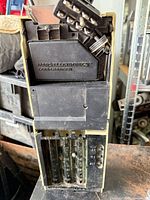 Front view of Mars TRC-6800C coin changer showing complete assembly with coin tubes and mounting plate