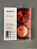 Front of sealed retail package displaying Sony MDR-ZX310AP headphones