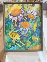 Front view of framed floral painting