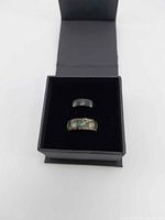 Two rings inside original Antler Rings box