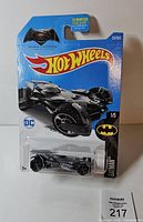 Front view of sealed Hot Wheels Batmobile blister card showing car and packaging details