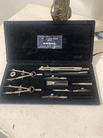 Open Besel 440N drafting set showing all instruments in velvet case