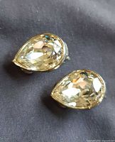 Close-up of pear crystal earrings front view