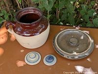 Crock and three lids overview