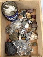 Entire drawer with Maxwell House tin, two zip bags of stones, loose rocks