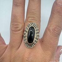 Ring on hand showing overall design
