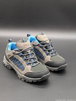 Pair of grey and blue Mountain Warehouse hiking shoes front and side view