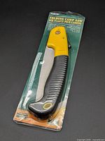 Front view of packaged Forest folding camp saw