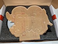Acrylic heart panel with protective film inside box foam