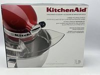 Front of boxed KitchenAid KN1PS pouring shield