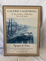 Full view of framed poster showing artwork, text and frame