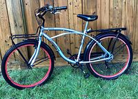 Left side full view of Columbia cruiser showing frame, wheels, racks, fenders and accessories
