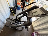 Full view of NordicTrack FS14i elliptical showing console, pedals and handlebars