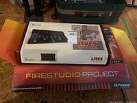 Overview of both retail boxes: Vocalist Live5 on top, FireStudio Project beneath