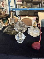Group view of all three crystal perfume pieces