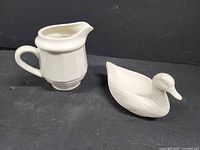 Both ceramic items side by side