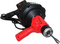 Side view of red and black handheld drain auger showing cable outlet and power cord