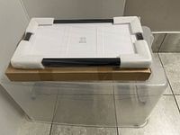 Frame in protective foam corners on box