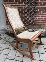 Full view of carved oak rocking chair