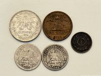 All five coins obverse sides visible