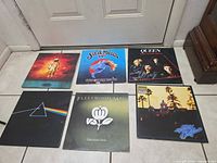 Front jackets of all six albums