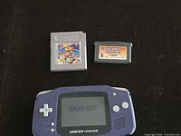 Game Boy Advance console with both cartridges