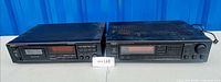 Front view of both Onkyo components side by side