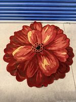 Full view of flower-shaped rug