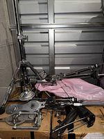 Overall view of hi-hat stand, pedal and hardware on boxes