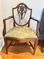 Full view of antique wood armchair