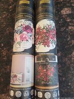 Both sealed re-design decor transfer rolls side by side