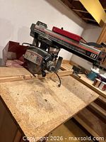 Full view of Craftsman radial arm saw on workbench