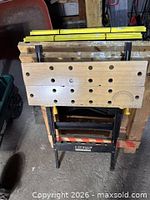 Ultra folding workbench front view, wood top visible
