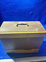 Closed hard carrying case with top handle