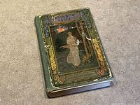 Front cover of 1919 Rainbow Valley showing worn pictorial paste-down