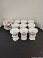 Group view of all cups and saucers showing quantity and pattern