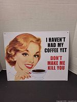 Full view of metal sign showing graphic and text