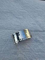 Front view of wide sterling cuff showing Tiffany & Co. 925 hallmark