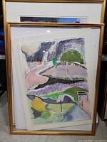 Full view of framed artwork showing subject and gold frame